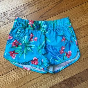 Kanu surf board shorts, size 8/10